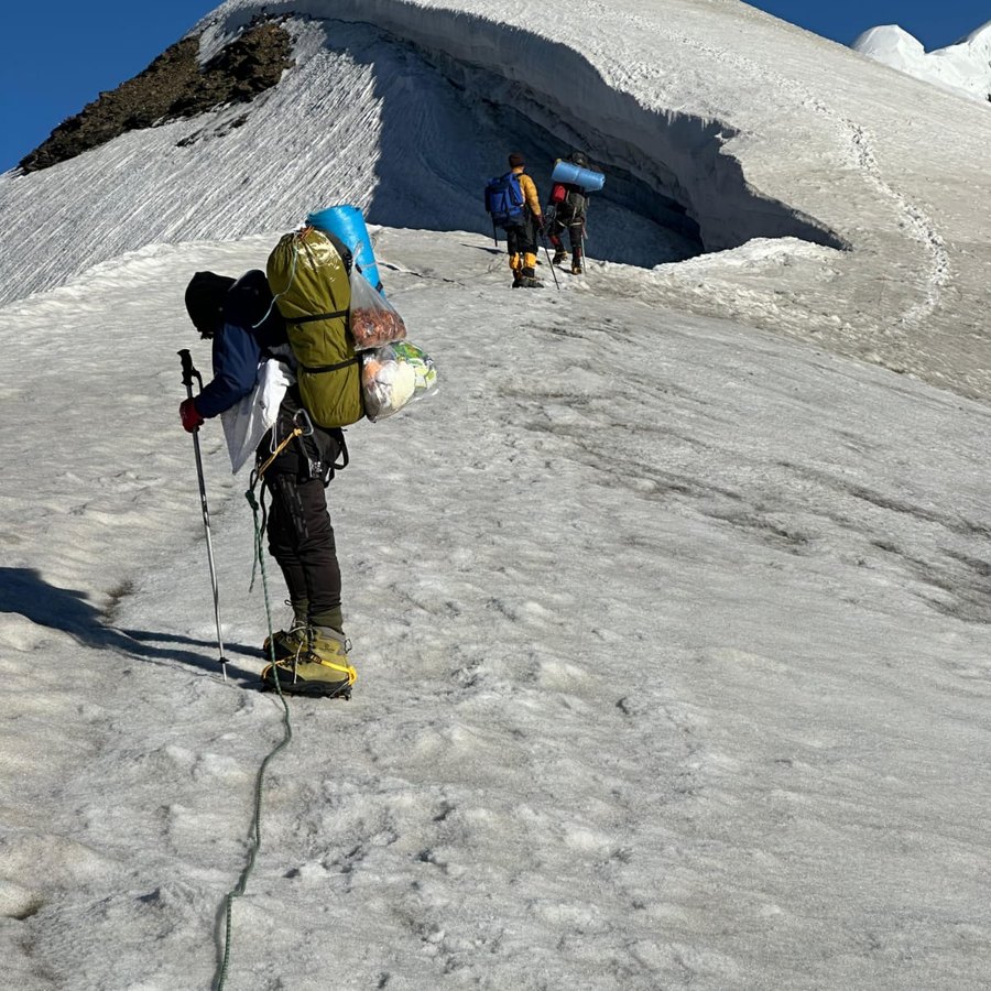 Walking a rocky ridge with a braided river far below